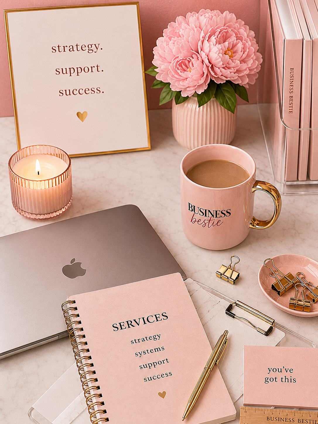 Styled feminine workspace with notebook, coffee, and business planning tools